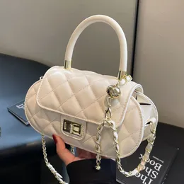 Fashion Classic Niche Chain Bag Female Portable Versatile Ins Chain Shoulder äkta läder Small Hande Bag Kvinna