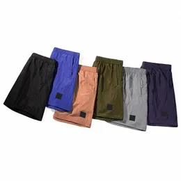 Herrdesigner shorts herr metall nylon shorts sten shorts snabb torkning badkläder stenar ö shorts m-2xl hög kvalitet