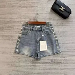 Kvinnors jeans södra olja hög kvalitet xiaoxiang 24 sommar ny tung handgjorda pärlkändis stil midja smala mjuka denimshorts för kvinnor