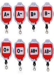 Hela nyckelringar blodtyp Medicinsk sjuksköterska utdragbar filt ID -märkehållare Rulle med alligatorklipp för gåva6547442