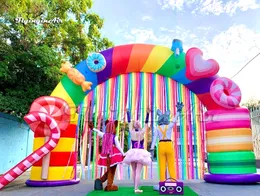 Atacado arco arco -íris inflável ao ar livre de 23 pés de largura de 23 pés de largura colorida soprar arco de doces curvo para decoração de parque e entrada de circo