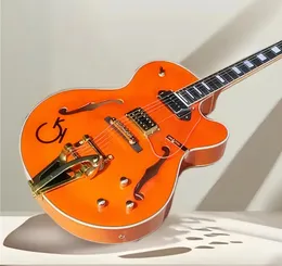 ジャズセミホローダブルFホールオレンジエレクトリックギター、ブリッジとゴールドのハードウェア、長方形の貨物