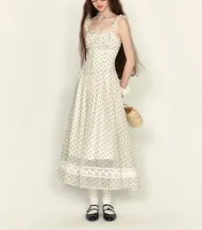 "Fresh and Sweet Polka Dot Halter Dress - New French Summer Style with Long Skirt, Flattering Waistline, and Thin Cover for a Chic Look"