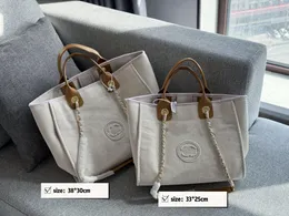 Axelväskor crossbody luxurys designer väska 10a mode kvinnors handväskor bokstäver dumpling dumplings handväska damer korsbodi koppling hög qua