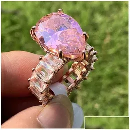 Anéis de casamento Anéis de casamento Novo jóias de luxo mais vendidas 925 Sier Sier Rose Rose Preenchimento grande rosa Sapphire CZ Diamond Pear Cut Ge Dhts5