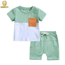 Set di abbigliamento Kukitty 2pcs T-shirt a maniche corta con tasche e cortometraggi casual Summer Abbigliamento set 0-2 anni J240518