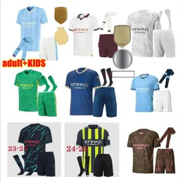 Uomini per bambini adulti Kit Man City City Halanland Soccer Maglie J.Alvarez Ederson 22 23 24 de Bruyne Mans Cities Grealish Bernardo Ederson Mahrez Foden 2023 2024 2025 Falliera