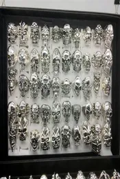Anello intero da 50 pezzi anello teschio grande gotico bohemian punk vintage antico mix argento mix da uomo gioielli di moda anello scheletro dimensione 2261c5559599