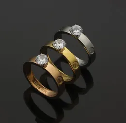 Anello d'amore stravagante di alta qualità Ringo a quattro pungini Solitaire Diamond Gold Silver Rose Colours Couple in acciaio inossidabile Rings Fashion Women 4876057