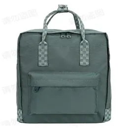 Мужской и женский рюкзак на открытом воздухе классический дизайн младший школьный холст.
