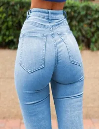 Сексуальные джинсы скинни женщины с высоты