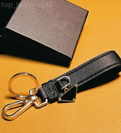 Portabo delle portachiavi di moda per tastiera di moda Top Brand Women Women Case Chain Case Chiave Prad Designer Leather Metal Keeychain Amante di alto livello Accessori