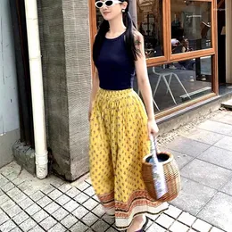 Röcke Vintage Yellow Flower Hippie Frauen Strand Bohomian Langer A-Linie Lose Maxi Elastic Taillenrock schön plissig