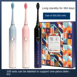 Leende. Elektrisk tandborste vuxen smart laddning par mjukt pälsvattentät sonisk elektrisk tandborste kit