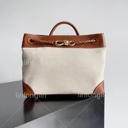 Kadınlar Lüks Tuval Çanta Çanta Lady Brown Tasarımcı Çanta Strap Deri Crossbody 10a Omuz Çantaları Moda Yay Düğüm Debriyaj Tote Üst Tutlu Tutlu