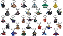 MOQ500PCS Super Hero Metalowe łańcuchy kluczy Cute Cartoon Key Miękkie pierścień PVC Anime Figurka Kluczowa klawisza Klucz Akcesoria Ozdoby 6796090
