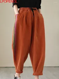 Jeans feminino primavera retro vertical listrado feminino bloqueio de cor casual calça de harém casual cintura literária lasca de cordão