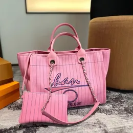 2023 Frühlings- und Sommer Neue Strandtasche Denim Bag Designer Tasche Luxus großer Kapazität Einkaufstasche Leinwand Tasche Damen Schulter -Einkaufstasche Fashion Einfacher Kettenbeutel