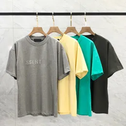 2024 Sıradan Trend Gevşek Erkekler Nefes Alabilir Kısa Kollu Tişört Moda Tasarımcı Ess Tshirt Yaz Plajı Gömlek Erkek Yuvarlak Boyun Tek renkli Mektup T-Shirt