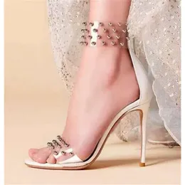 Mode nyaste kvinnor Öppna tå Clear PVC Rivet Pärled Stiletto Transparent Back dragkedja med hög häl sandaler Dr 517