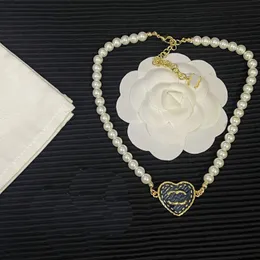Collana oro in oro 18K di lusso Brand Designer Fashion Link Pearl Link Collana a sospensione a forma di cuore Collana affascinante Collana di alta qualità con regali boutique in scatola