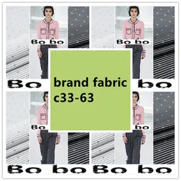 C33-63 Avrupa ve Amerika Birleşik Devletleri Yüksek dereceli üç boyutlu iplik boyalı jakar kıyafetli kumaş elbise hendek kıyafeti brokar marka tasarımcısı kumaş