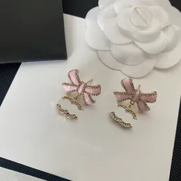 Luxus 18K-Ohrringe mit 18K-Ohrhörern, die Markendesignerin Pink Bogen geformtes süßes Mädchen exklusive Ohrringe hochwertiger Diamant eingelegtes modisches Ohrringbox