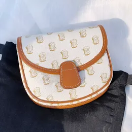 Kvinnors sadlar axel designer crossbody väska tonåring triomfer besatt läder handväskor messenger väskor lyxiga koppling mens satchel klassiska flap kosmetiska väskor