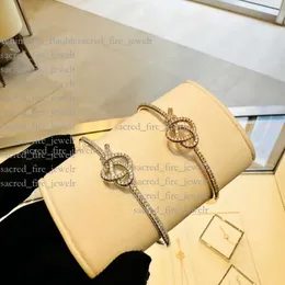 Tiffanyjewelry Neues Armband für Frauen Tiffanyjewelry Armband mit 18 Karat Gold gewebten Knoten gewebten Keys Klassiker Designer Schmuck Full Diamond Bracelet Network 9810