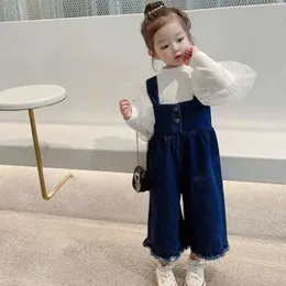 Overalls ROMPERS 2022 Mädchen Kleidung Frühling Neue Hosen Mode Kinder -Denim -Top -Baby -Suspension Weitbeinhose 9 Punkt Wx5.26ngl8