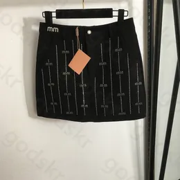 Pacote de letra de perfuração saia de quadril mulheres sexy elástico preto mini -saia zíper saia Faldas Mujer moda elegantes