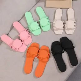 2024 Mulheres sandálias Designers chinelos de borracha interligam sandálias de borracha de borracha verde pálida 35-41 White Black Mens Slipper Womens Slides de laranja rosa para homens