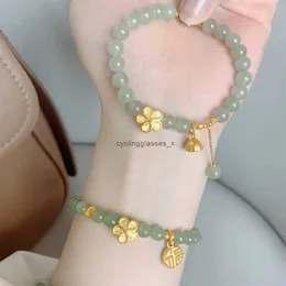 2024Advanced Sense Light Luxury Niche Design Peach Blossom Burning Imitation Jade Bracelet Beads China-Chic Style Ins Hand String Tide