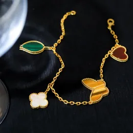 Top-Qualität V Gold Lucky Vier-Blatt Klee Schmetterlingsarmband Naturtiersteiner-Perlmutter Armband Frauengeschenke