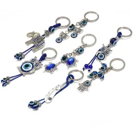 Chaços de chaves da moda animal borboleta elefante elefante Evil Eyes Keychain Key Chain Chain Blue Eye Pendant Ornament Drop Deliv Dhmwh