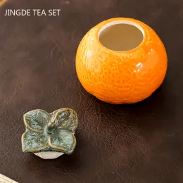 Criatividade Modelo laranja Cerâmica Caddy Tieguanyin Tanque de armazenamento selado