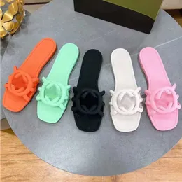 Designer Sandaler Kvinnor Låsande G Slides gummi tofflor damer platt strand gelé manus orange sommar höst mulor utomhus vattentäta platt tofflor og