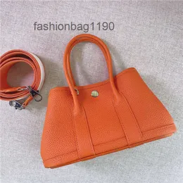 Borse da donna Hermlogo Designer Modello classico all'ingrosso 2024 Giardino Nuovo Litchi Top Mini Layer Borsa in pelle di vacchetta Versatile One spalla Messenger Portabl MH0J