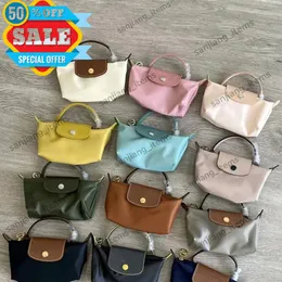 Vikbar mini crossbody axelväska nylon med läderhandtag shopping totar liten handväska berömd designer dumpling kudde skopa messenger purses handväskor hobo