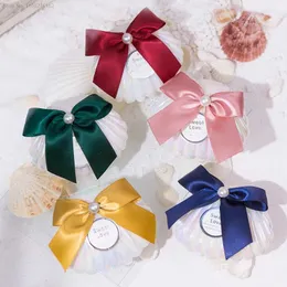Confezione regalo 20 pezzi di conchiglia dorata creativa Decorazione di nozze Scatola di caramelle Bomboniere e regali per gli ospiti Imballaggi in plastica al cioccolato
