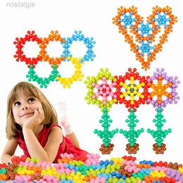 Blocos 290pcs de blocos de construção de flor de ameixa 3D girando fatias de floco de neve 3D Splicing plástico DIY brinquedos para quebra-cabeça educação precoce 240401