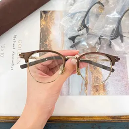 Montature per occhiali da sole Occhiali da vista stile ovale dal design giapponese per uomo e donna in lega con montatura in collage semi-orlo in acetato Lente personalizzabile