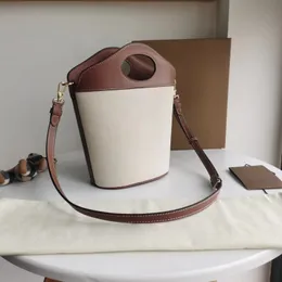 designer Bucket pocket cowhide small bucket bag handbag with oval cut handle and diagonal cross bag especially suitable for beautiful women love classic handbags