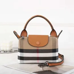 Stilvolle Luxus-Straddle-Tasche aus echtem Leder, kleine Knödel für Damen, neue, vielseitige diagonale Textur, beliebt im Internet, hochwertige Handy-Handtasche zum Mitnehmen