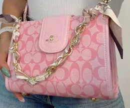 Borsa da donna classica di moda 2024 Nuova borsa di moda di design di nicchia con borsa a tracolla da trasporto stampata di fascia alta 23-16-9 cm