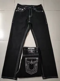 2024 Дизайнерские мужские джинсы скинни черные скинни наклейки с легкой мытьем разорванной мотоциклетной скалой. Возрождение бегунов Истинные религии фиолетовые джинсы 7 MWG8