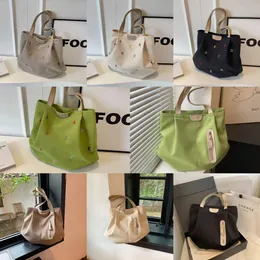 24SS Borsa tote da donna alla moda impermeabile in tessuto Oxford ricamato con alfabeto Borsa piccola a spalla singola per studenti freschi Borsa in tela di grande capacità Shopping bag 35 cm