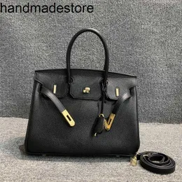 Echtes Leder -BK -Designer Handtasche Das Einkaufszentrum entfernte Waren aus dem Schrank. Lear Womens Bag ist die erste Schicht aus