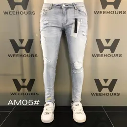 Nuovo stile Men039s and Women039s Jeans Slim Locomotive Denim Fashion Trendy Hiphop Men039s Jeans AM057630265