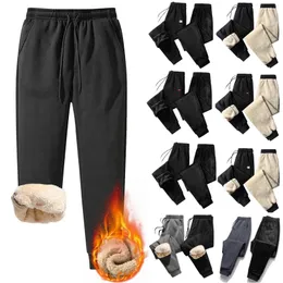 Męskie spodnie 1PCS Duża lambota z zagęszczającą stóp luźne bawełniane spodnie dresowe dla mężczyzn zima